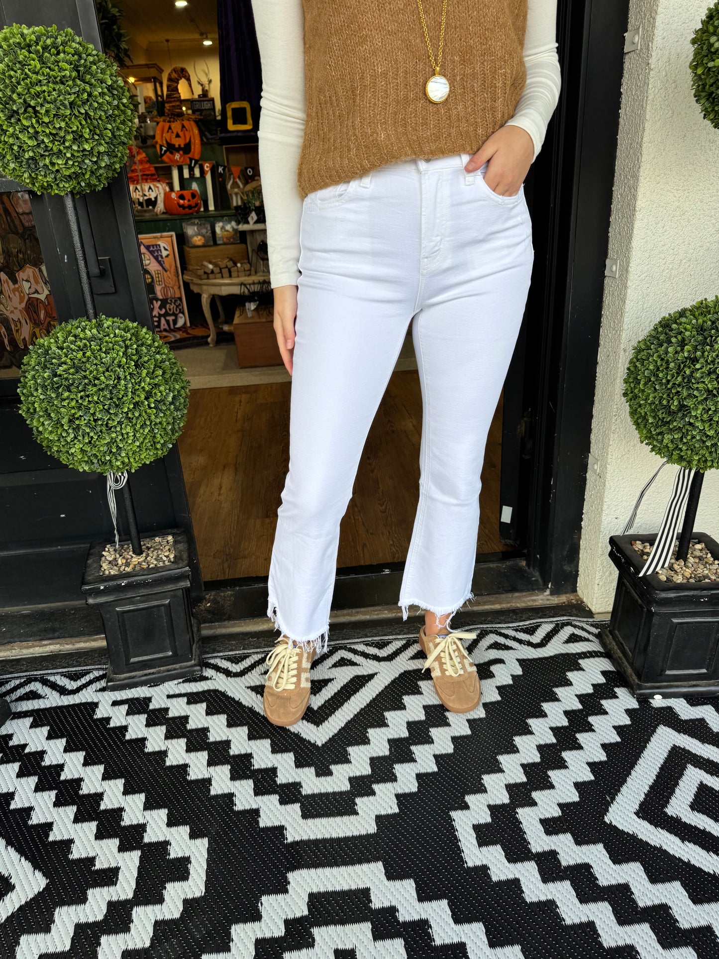 High Rise Crop Flare With Step Hem Detail