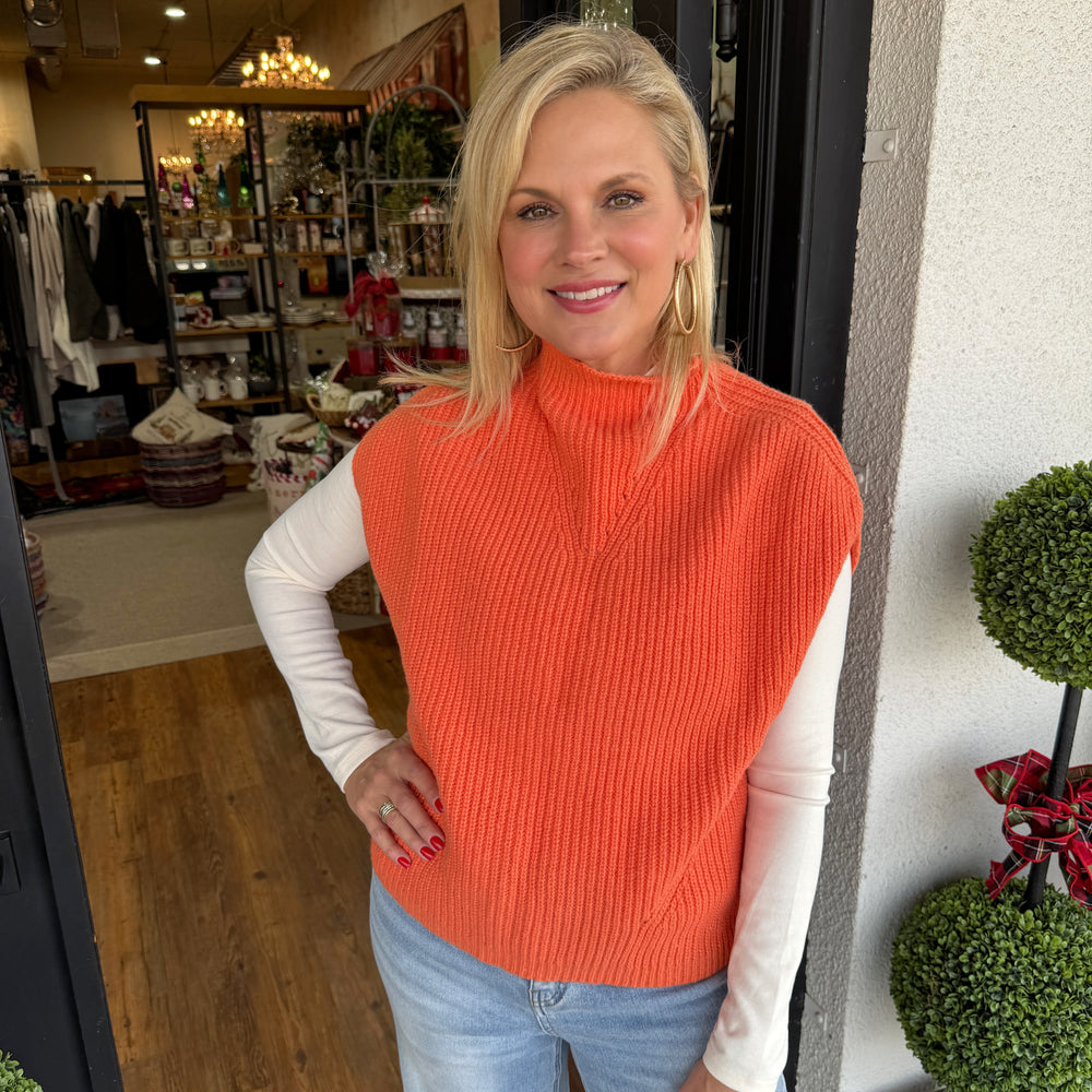 
                  
                    Avani Turtleneck Ribbed Vest- Orange
                  
                