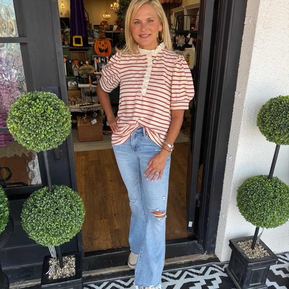 Mid Rise Flare With Hem Detail Jean