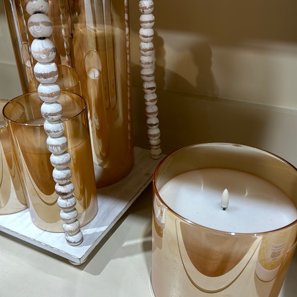 
                      
                        Radiance Flameless Candle
                      
                    