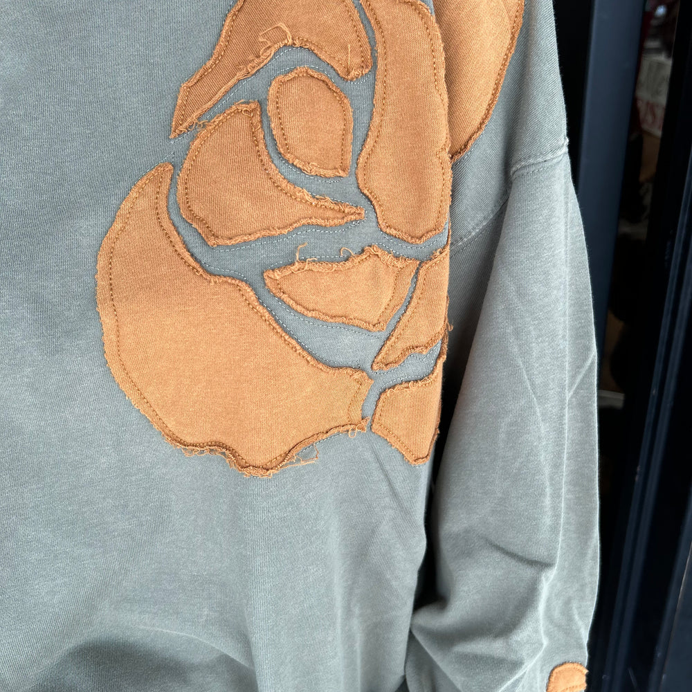 
                      
                        Rose Sweatshirt
                      
                    