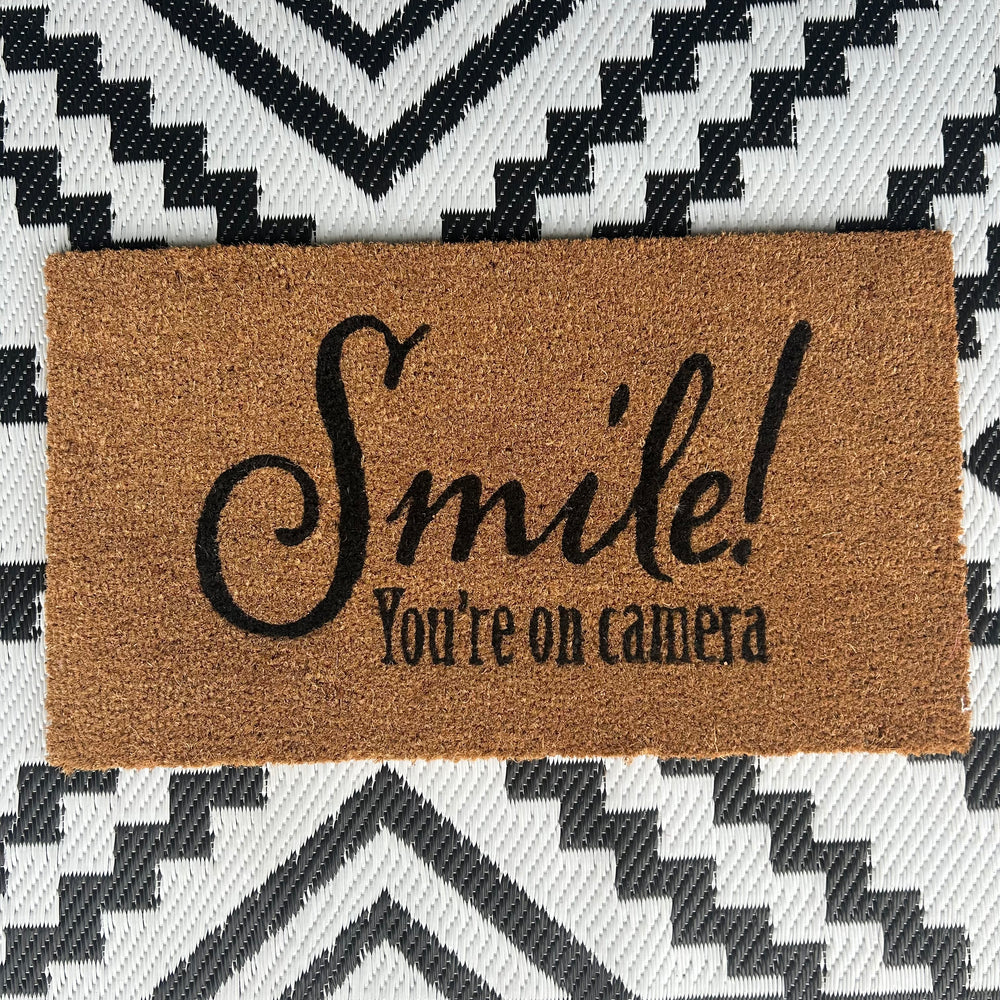 Smile! You’re on camera Rug