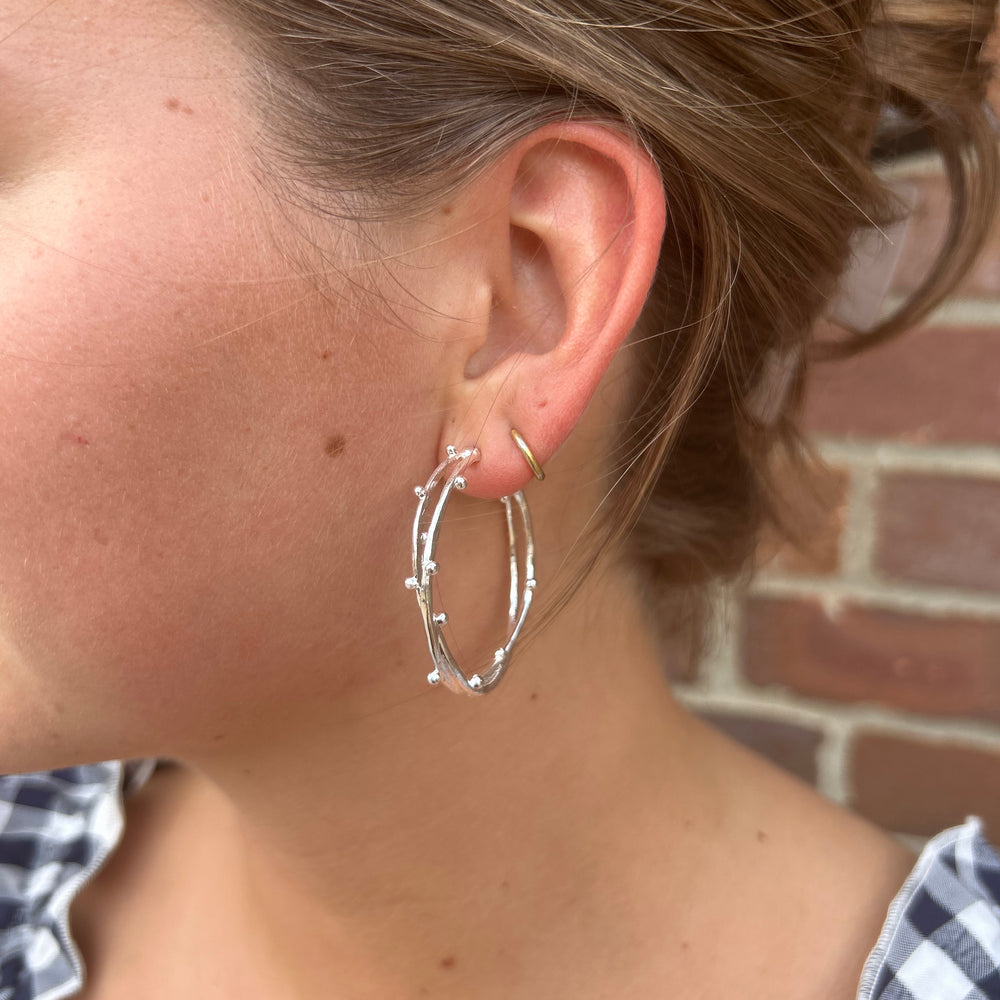 
                      
                        Twisted Hoop Earring
                      
                    